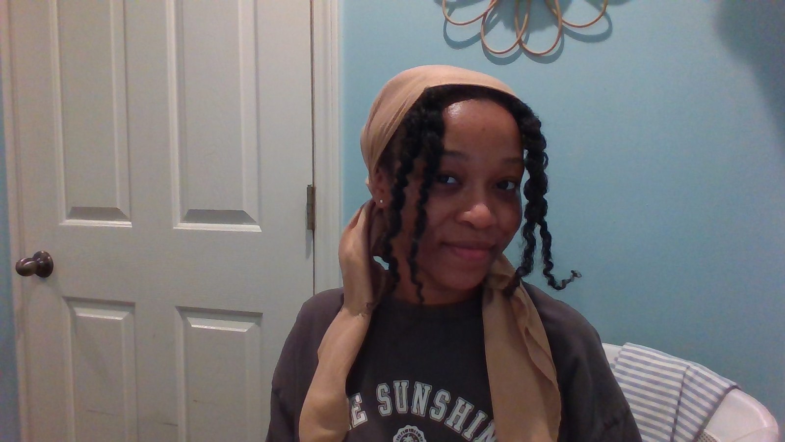 Portrait of Jasmine, founder of DaughtersBeWhole, smiling warmly